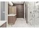 Modern bathroom with marble shower and double vanity at 711 S Palm Ave # 303, Sarasota, FL 34236
