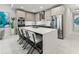 Modern kitchen with stainless steel appliances and large island at 711 S Palm Ave # 303, Sarasota, FL 34236