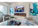 Living room with a modern fireplace and stylish decor at 711 S Palm Ave # 303, Sarasota, FL 34236