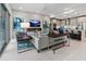 Spacious living room with fireplace and modern furniture at 711 S Palm Ave # 303, Sarasota, FL 34236