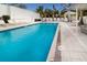 Refreshing community pool with plenty of lounge chairs and shade at 711 S Palm Ave # 303, Sarasota, FL 34236