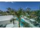 Resort-style pool with lounge chairs and cabanas at 711 S Palm Ave # 303, Sarasota, FL 34236