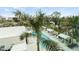 Refreshing pool area with ample lounge space and lush landscaping at 711 S Palm Ave # 303, Sarasota, FL 34236