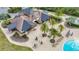 Resort-style pool and community clubhouse with outdoor seating at 7486 Divot Loop # 7486, Bradenton, FL 34202