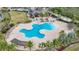 Community pool with lap lanes and plenty of lounge space at 7486 Divot Loop # 7486, Bradenton, FL 34202