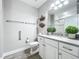Clean bathroom with single vanity and a toilet at 7486 Divot Loop # 7486, Bradenton, FL 34202
