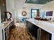 Community kitchen features modern appliances and a spacious island at 7486 Divot Loop # 7486, Bradenton, FL 34202