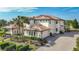 Luxury two-story home with tile roof, and landscaped grounds at 7486 Divot Loop # 7486, Bradenton, FL 34202