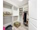 Large walk-in closet with ample shelving and hanging space at 7486 Divot Loop # 7486, Bradenton, FL 34202
