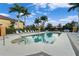 Refreshing community pool with ample seating at 7911 Grand Estuary Trl # 204, Bradenton, FL 34212