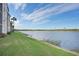 Enjoy serene waterfront living with lush grass lawn leading to a large scenic lake at 7911 Grand Estuary Trl # 204, Bradenton, FL 34212