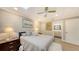 Charming bedroom with ceiling fan, skylights and ensuite access at 7938 Pinegrove Ct # 12, Sarasota, FL 34238