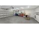 Large garage with ample storage and workshop space at 7938 Pinegrove Ct # 12, Sarasota, FL 34238