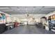 Bright and spacious garage with overhead storage and room for bikes at 7938 Pinegrove Ct # 12, Sarasota, FL 34238