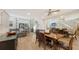 Open living room with comfortable seating and access to patio at 7938 Pinegrove Ct # 12, Sarasota, FL 34238