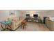 Home office with two workstations and plenty of natural light at 7938 Pinegrove Ct # 12, Sarasota, FL 34238
