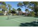 Enjoy a game on the community tennis court at 7938 Pinegrove Ct # 12, Sarasota, FL 34238
