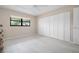 Spacious bedroom with large closet and window at 8773 Midnight Pass Rd # 205G, Sarasota, FL 34242