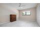 Second bedroom with ample closet space and wood floors at 8773 Midnight Pass Rd # 205G, Sarasota, FL 34242