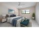 Bright bedroom featuring a bed and stylish decor at 8773 Midnight Pass Rd # 205G, Sarasota, FL 34242