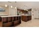 Modern community kitchen with stainless steel appliances at 8773 Midnight Pass Rd # 205G, Sarasota, FL 34242