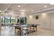 Community room with ping pong table and pool view at 8773 Midnight Pass Rd # 205G, Sarasota, FL 34242