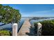 Wooden dock extending into the water at 8773 Midnight Pass Rd # 205G, Sarasota, FL 34242