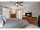 Main bedroom with ample closet space and wood dresser at 8773 Midnight Pass Rd # 205G, Sarasota, FL 34242
