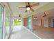 Sunroom offering a view of the backyard and lake at 8812 46Th W Ave, Bradenton, FL 34210