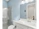 Clean bathroom with a single vanity and walk-in shower at 9085 Bernini Pl, Sarasota, FL 34240