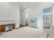 Charming bedroom with a king-size bed and en-suite bathroom at 9085 Bernini Pl, Sarasota, FL 34240