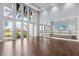Dance studio with wood floors, mirrors, and barre; lots of natural light at 9085 Bernini Pl, Sarasota, FL 34240