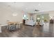 Casual dining area with round table and built-in hutch at 9085 Bernini Pl, Sarasota, FL 34240