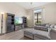 Relaxing living room with sectional sofa and built-in shelving at 9085 Bernini Pl, Sarasota, FL 34240