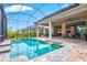 Inviting screened pool with paver deck at 9085 Bernini Pl, Sarasota, FL 34240