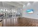 Bright studio with wood floors, mirrors, and ballet barre at 9085 Bernini Pl, Sarasota, FL 34240