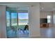 View of a relaxing patio overlooking a lake at 9814 Daybreak Gln, Parrish, FL 34219