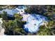 Community waterpark with sprayground and shaded seating at 9814 Daybreak Gln, Parrish, FL 34219