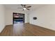 Spacious bedroom featuring wood-look floors and sliding doors opening to a patio with pool views at 10128 Milky Way Cir, Sarasota, FL 34241