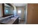 Updated bathroom with vanity, granite countertop, and shower at 10315 Cortez W Rd # 37F, Bradenton, FL 34210
