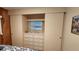Bedroom closet with built-in dresser and window at 10315 Cortez W Rd # 37F, Bradenton, FL 34210