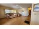 Living room featuring light wood floors and comfortable seating at 10315 Cortez W Rd # 37F, Bradenton, FL 34210