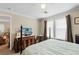 Bright bedroom with a comfortable bed and dresser at 1106 49Th Avenue W Dr, Bradenton, FL 34207