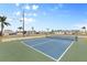 Community pickleball court with green and blue surface at 1106 49Th Avenue W Dr, Bradenton, FL 34207