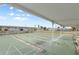 Community shuffleboard courts under covered area at 1106 49Th Avenue W Dr, Bradenton, FL 34207