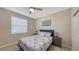 Cozy bedroom with a double bed and plenty of natural light at 12413 Osorio Ct # 103, Sarasota, FL 34238