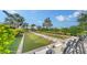 Community bocce ball court with seating area at 12413 Osorio Ct # 103, Sarasota, FL 34238