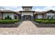 Front entrance and walkway of the community clubhouse at 12413 Osorio Ct # 103, Sarasota, FL 34238