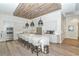 Modern community kitchen with an island and stainless steel appliances at 12413 Osorio Ct # 103, Sarasota, FL 34238