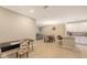 Bright dining area with table and chairs, adjacent to kitchen and living room at 12413 Osorio Ct # 103, Sarasota, FL 34238